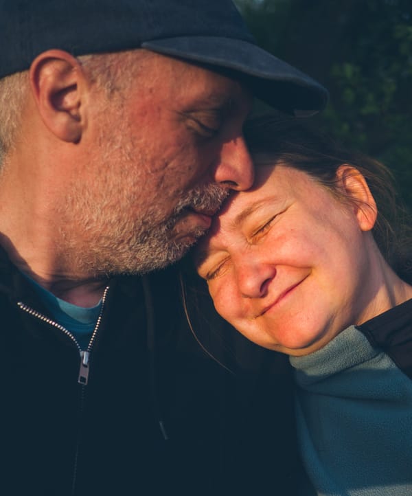 selfie of a man and a woman in the evening sun